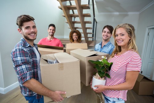 Removal van and packed boxes outside a Walthamstow terrace house