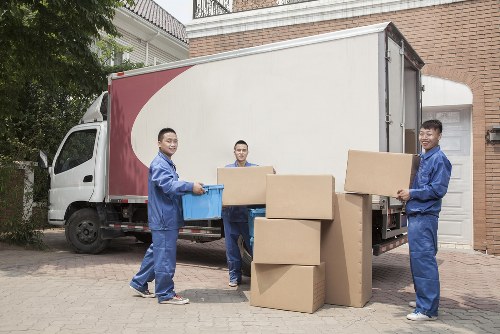 Man and van removals team loading furniture in Walthamstow