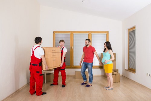 Removal crew preparing boxes for a move in Walthamstow
