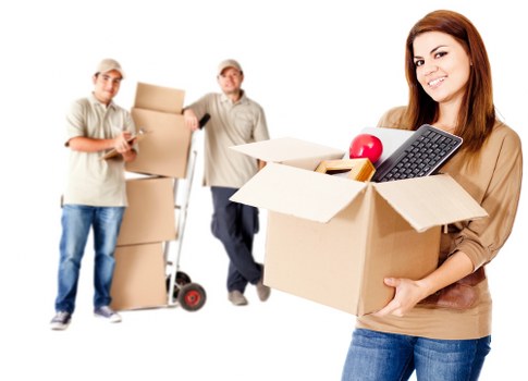 Loading furniture and boxes into a removal truck in Walthamstow