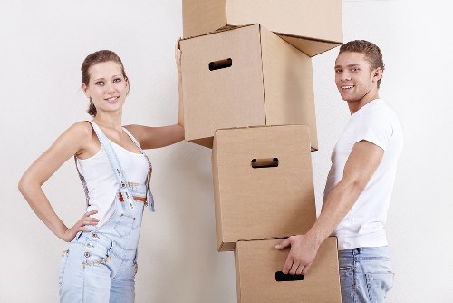Professional movers handling a residential relocation in East London
